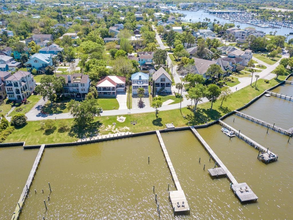 Aerial view of waterfront homes with private docks on Clear Lake