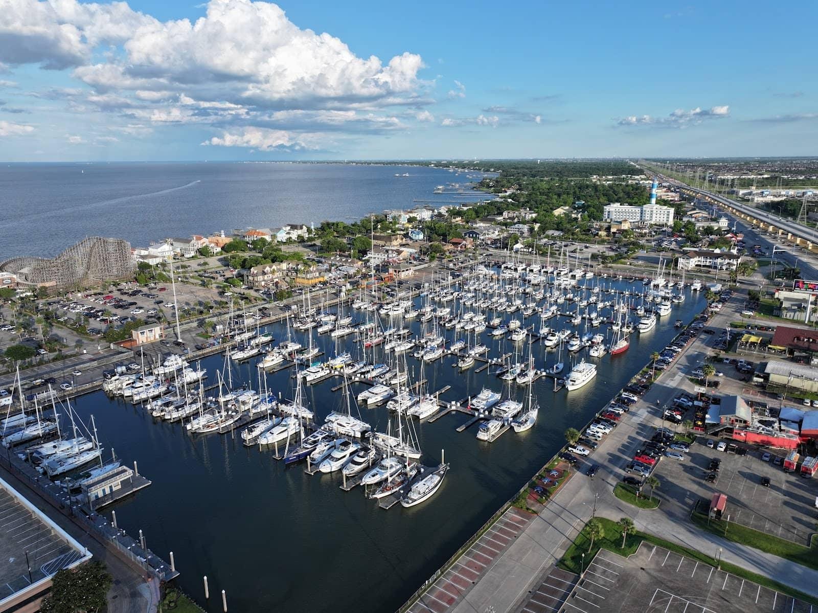 Aerial view of the Kemah Boardwalk and its marina full of boats